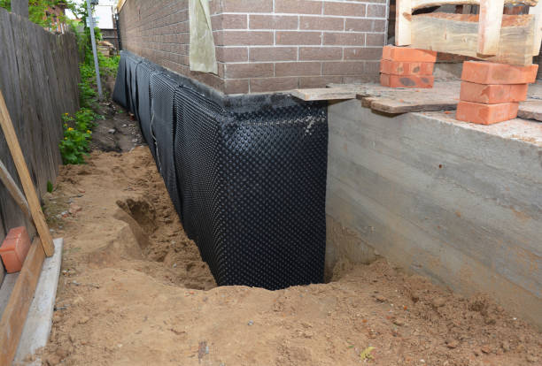 Happy homeowners after waterproofing job in Port Norris